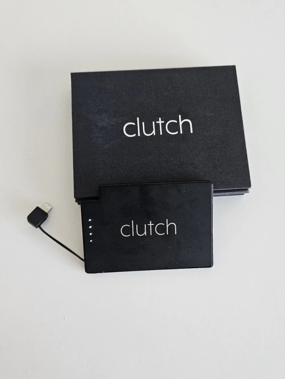 Clutch Thin Portable Charger Attached Charge Cable Lightning UCLA Surgery Phone